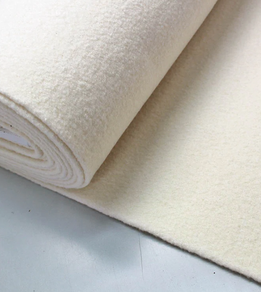 Why does wool have a specific smell?