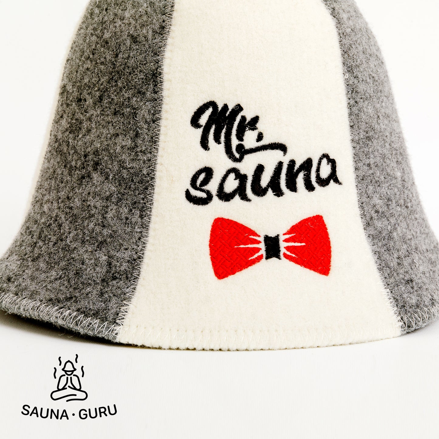 Light grey and white wool sauna hat with 'Mr. Sauna' text and red bow tie graphic
